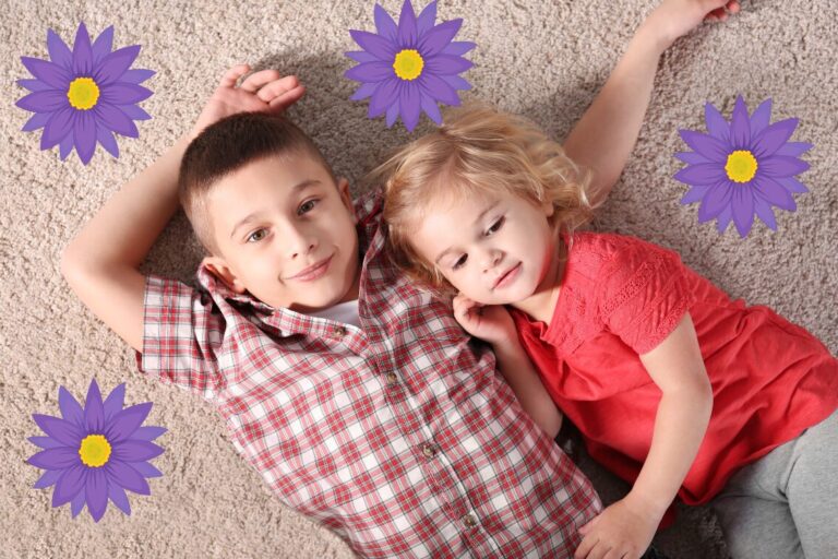 Children lying on soft floral carpet